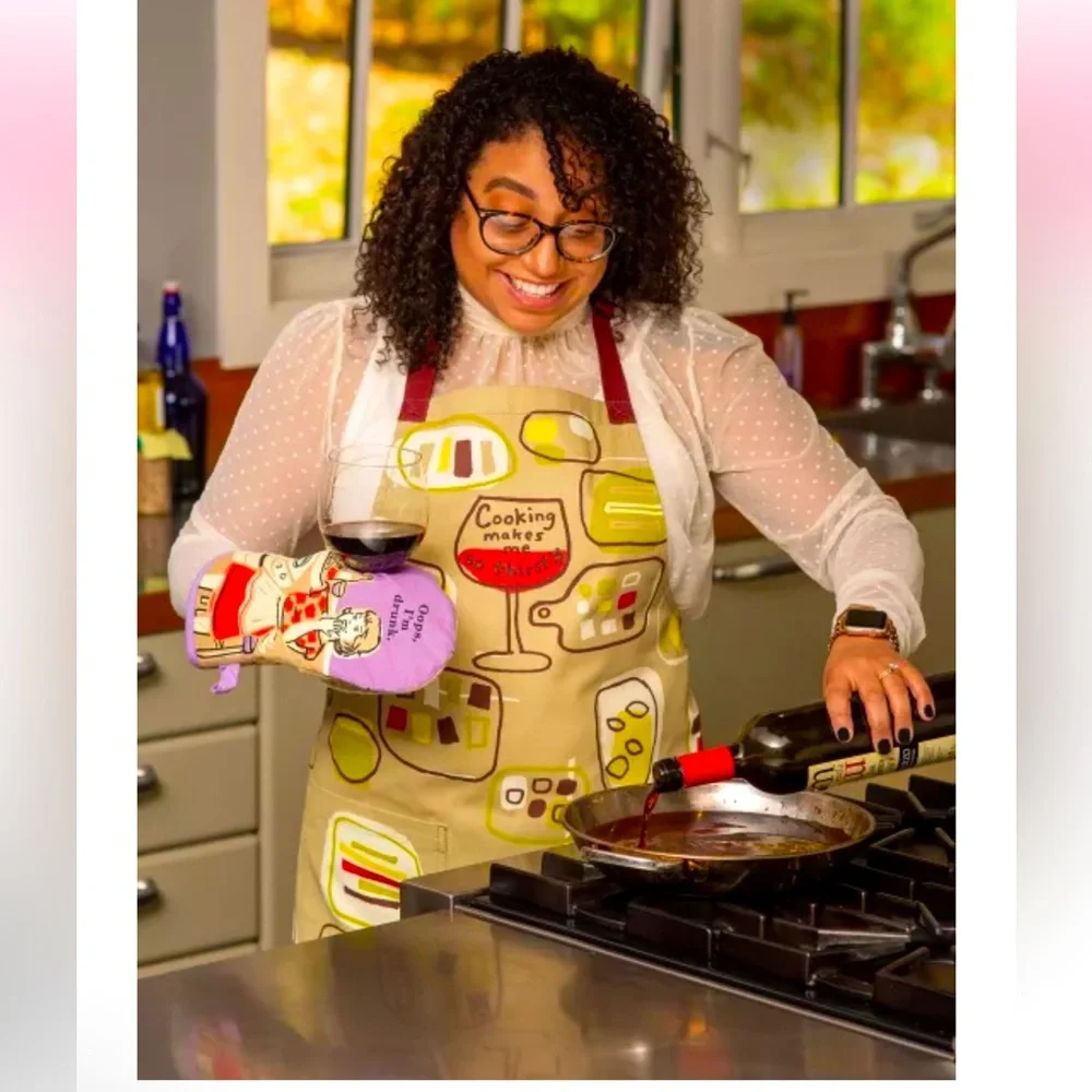 NWT Blue Q apron. “Cooking makes me so thirsty” featuring wine glasses.